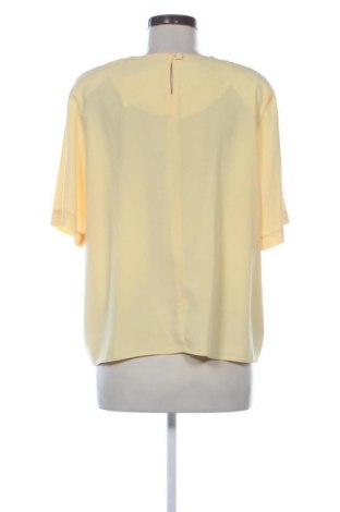 Bluzka damska Canda, Rozmiar XL, Kolor Żółty, Cena 52,42 zł