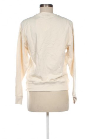 Női blúz PUMA, Méret XS, Szín Ekrü
, Ár 15 889 Ft