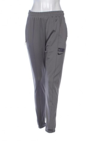 Dámske tepláky Nike, Veľkosť M, Farba Sivá, Cena  24,95 €