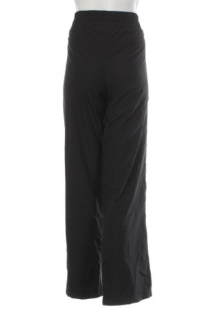 Damskie spodnie sportowe PUMA, Rozmiar 3XL, Kolor Czarny, Cena 73,99 zł