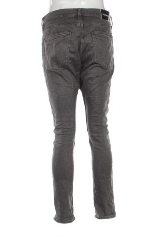 Męskie jeansy Calvin Klein Jeans, Rozmiar L, Kolor Szary, Cena 188,99 zł