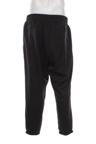 Męskie spodnie sportowe PUMA, Rozmiar L, Kolor Czarny, Cena 98,99 zł