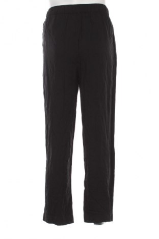 Piżama
 Calvin Klein, Rozmiar S, Kolor Czarny, Cena 220,99 zł