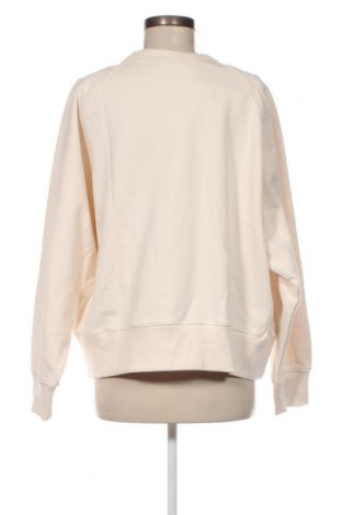 Γυναικεία μπλούζα New Balance, Μέγεθος XL, Χρώμα  Μπέζ, Τιμή 52,58 €