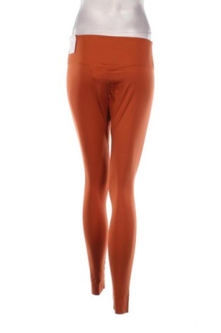 Γυναικείο κολάν Nike, Μέγεθος L, Χρώμα Πορτοκαλί, Τιμή 28,95 €
