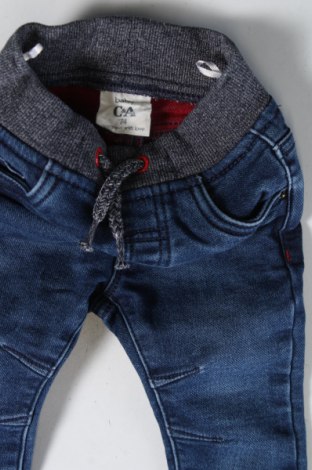 Dziecięce jeansy C&A, Rozmiar 6-9m/ 68-74 cm, Kolor Niebieski, Cena 36,05 zł