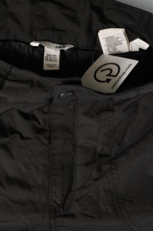 Dětské kalhoty pro zimní sporty  H&M, Velikost 13-14y/ 164-168 cm, Barva Černá, Cena  670,00 Kč