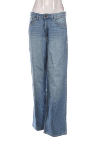 Damskie jeansy H&M, Rozmiar L, Kolor Niebieski, Cena 63,99 zł