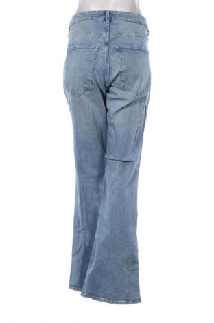 Damskie jeansy H&M, Rozmiar L, Kolor Niebieski, Cena 79,15 zł