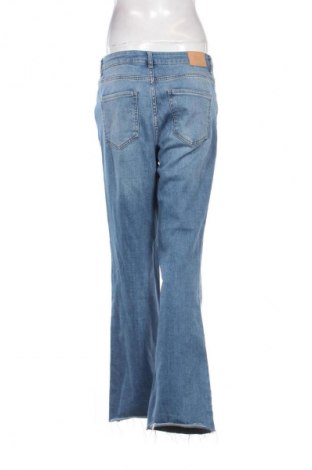 Damskie jeansy Zara, Rozmiar L, Kolor Niebieski, Cena 74,01 zł