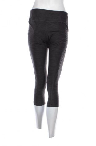 Damskie legginsy H&M Sport, Rozmiar L, Kolor Kolorowy, Cena 44,37 zł