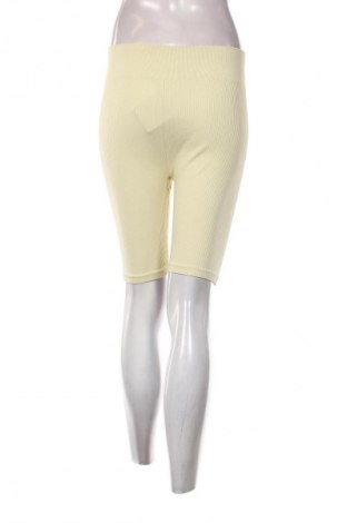 Damskie legginsy H&M Sport, Rozmiar L, Kolor Żółty, Cena 29,99 zł