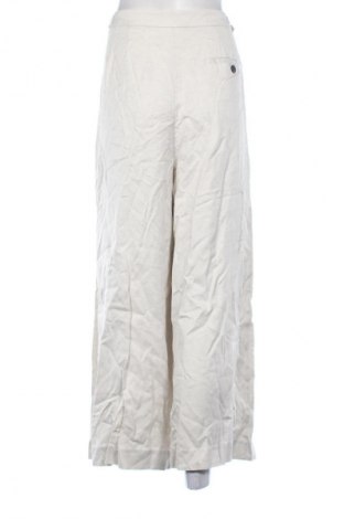 Damskie spodnie Next, Rozmiar XL, Kolor ecru, Cena 250,99 zł