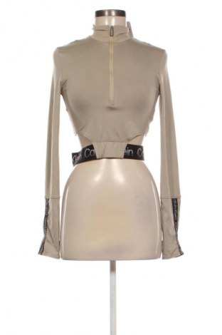 Γυναίκειο αθλητικό τοπ Calvin Klein, Μέγεθος S, Χρώμα  Μπέζ, Τιμή 19,99 €