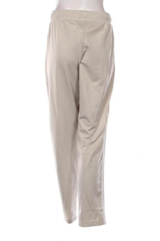 Дамско спортно долнище Adidas, Размер L, Цвят Екрю, Цена 38,85 €