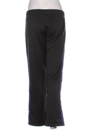 Damskie spodnie sportowe Adidas, Rozmiar L, Kolor Kolorowy, Cena 103,99 zł