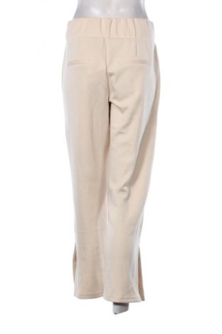 Damskie spodnie sportowe Creation L, Rozmiar M, Kolor ecru, Cena 249,87 zł