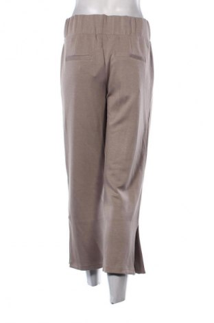 Damskie spodnie sportowe Creation L, Rozmiar L, Kolor Beżowy, Cena 249,87 zł