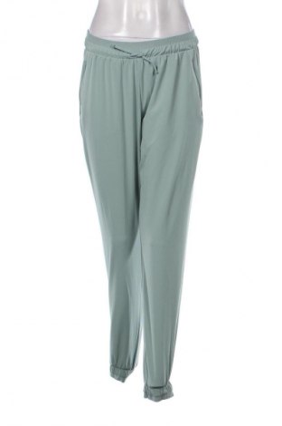 Damskie spodnie sportowe Decathlon, Rozmiar M, Kolor Zielony, Cena 80,38 zł