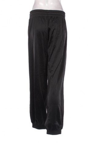 Γυναικείο αθλητικό παντελόνι Domyos, Μέγεθος M, Χρώμα Μαύρο, Τιμή 14,83 €