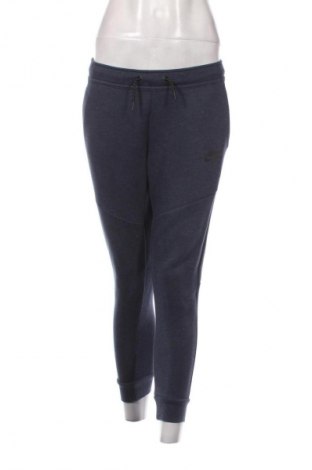 Damskie spodnie sportowe Nike, Rozmiar M, Kolor Niebieski, Cena 250,99 zł