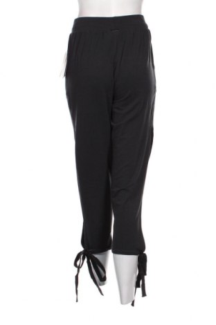 Γυναικείο αθλητικό παντελόνι New Balance, Μέγεθος S, Χρώμα Μαύρο, 80% πολυεστέρας, 14% lyocell, 6% ελαστάνη, Τιμή 36,12 €