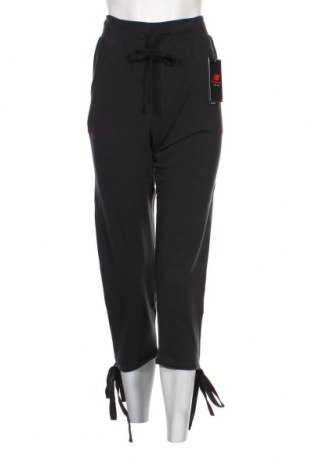 Γυναικείο αθλητικό παντελόνι New Balance, Μέγεθος XS, Χρώμα Μαύρο, 80% πολυεστέρας, 14% lyocell, 6% ελαστάνη, Τιμή 36,12 €