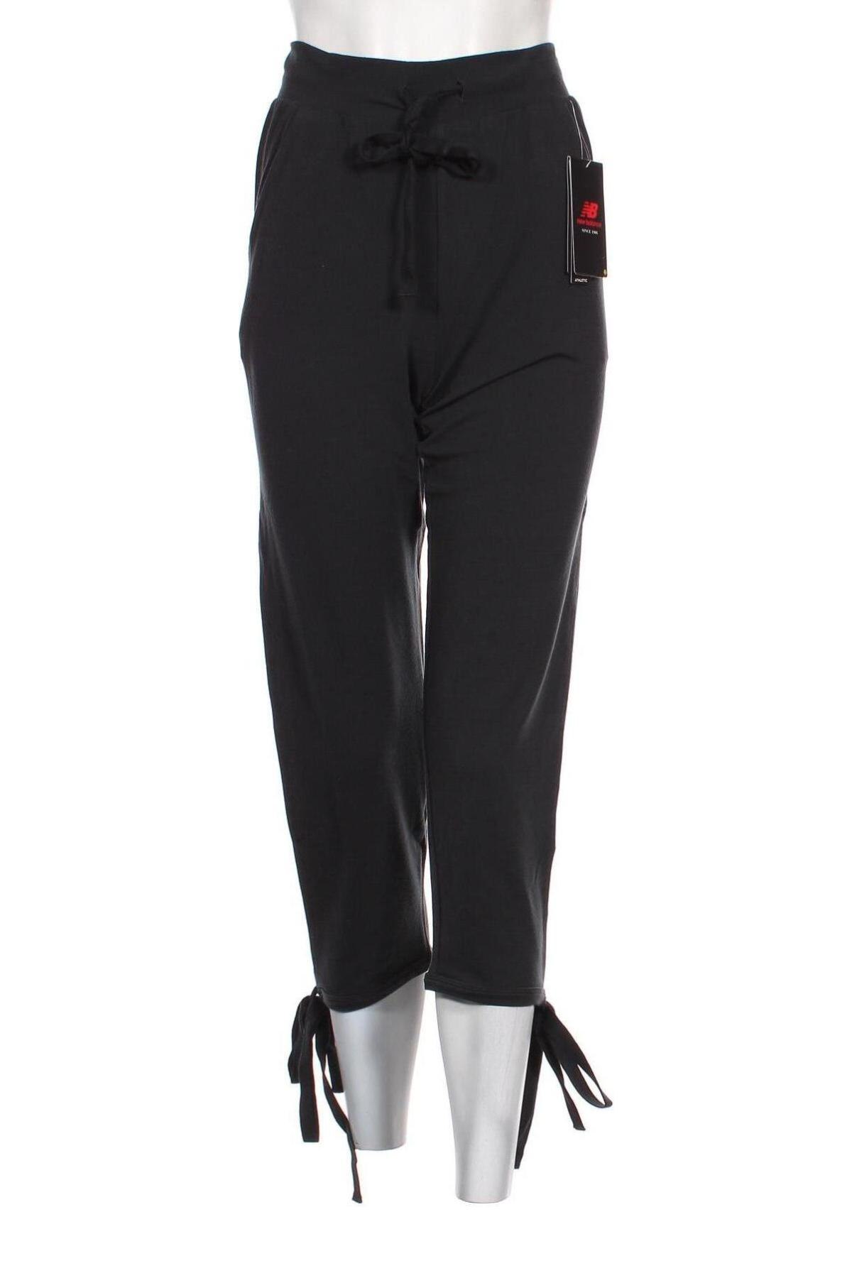Γυναικείο αθλητικό παντελόνι New Balance, Μέγεθος XS, Χρώμα Μαύρο, 80% πολυεστέρας, 14% lyocell, 6% ελαστάνη, Τιμή 36,12 €
