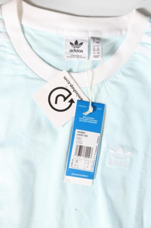 Bluzka damska Adidas Originals, Rozmiar XS, Kolor Niebieski, Cena 271,88 zł