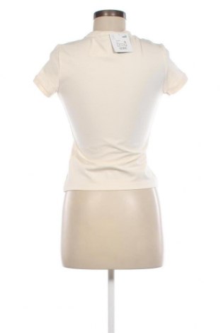 Γυναικείο t-shirt PUMA, Μέγεθος S, Χρώμα  Μπέζ, Τιμή 29,90 €