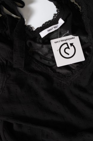 Γυναικείο αμάνικο μπλουζάκι About You, Μέγεθος XS, Χρώμα Μαύρο, Τιμή 6,26 €