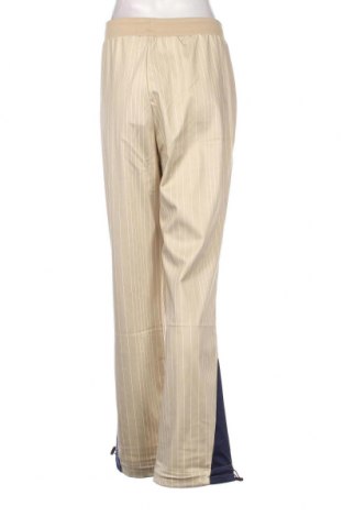 Дамски спортен панталон FILA, Размер XL, Цвят Бежов, Цена 30,96 лв.