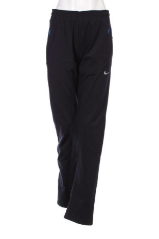 Pantaloni trening de femei Nike, Mărime M, Culoare Albastru, Preț 200,00 Lei