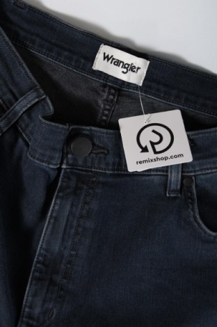 Męskie jeansy Wrangler, Rozmiar XL, Kolor Niebieski, Cena 287,52 zł