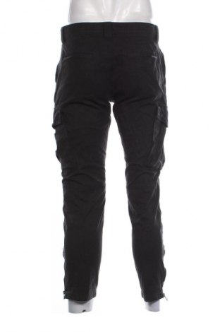 Pánské kalhoty  Calvin Klein Jeans, Velikost M, Barva Černá, Cena  1 099,00 Kč