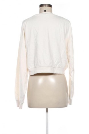 Bluzka damska H&M Divided, Rozmiar L, Kolor Beżowy, Cena 18,99 zł