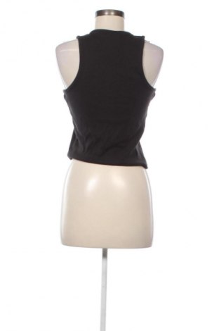 Γυναικείο t-shirt Tommy Jeans, Μέγεθος L, Χρώμα Μαύρο, Τιμή 20,99 €