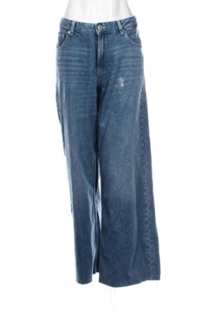 Dámské džíny  Bershka, Velikost L, Barva Modrá, Cena  425,00 Kč