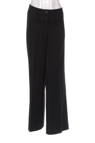 Damskie spodnie Colours Of The World, Rozmiar L, Kolor Kolorowy, Cena 131,57 zł