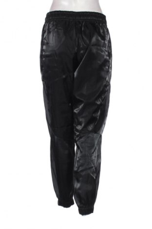 Γυναικείο αθλητικό παντελόνι Nike, Μέγεθος M, Χρώμα Μαύρο, Τιμή 24,99 €