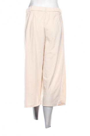 Damskie spodnie SHEIN, Rozmiar L, Kolor ecru, Cena 80,38 zł