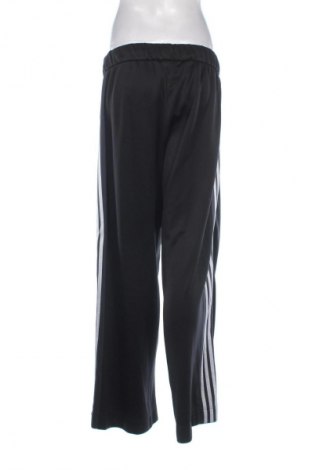 Damskie spodnie sportowe Adidas, Rozmiar L, Kolor Czarny, Cena 112,53 zł