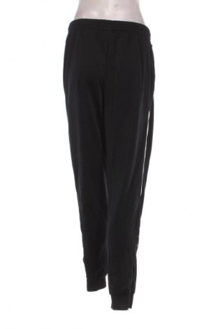 Дамско спортно долнище Jako, Размер XL, Цвят Многоцветен, Цена 7,66 €