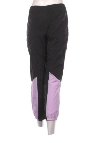 Damskie spodnie sportowe Nike, Rozmiar S, Kolor Kolorowy, Cena 107,99 zł