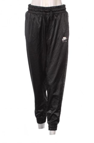 Damskie spodnie sportowe Nike, Rozmiar M, Kolor Czarny, Cena 118,99 zł