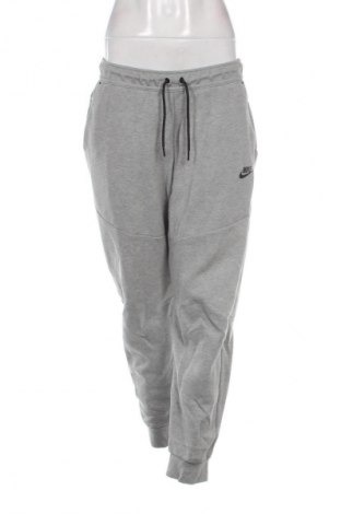 Damskie spodnie sportowe Nike, Rozmiar L, Kolor Szary, Cena 95,99 zł