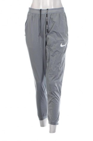 Dámské tepláky Nike, Velikost S, Barva Šedá, Cena  549,00 Kč