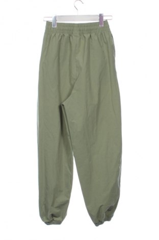 Damskie spodnie sportowe Nike, Rozmiar XS, Kolor Zielony, Cena 112,53 zł