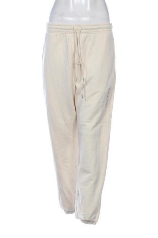 Дамско спортно долнище Uniqlo, Размер XL, Цвят Екрю, Цена 17,89 €