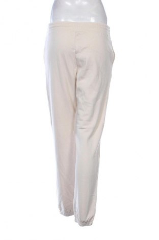 Damen Sporthose Uniqlo, Größe S, Farbe Beige, Preis € 11,99